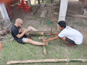 Sawing bamboo is a two man job!